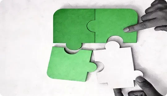 Puzzle pieces coming together, symbolizing the multi-level partnership program